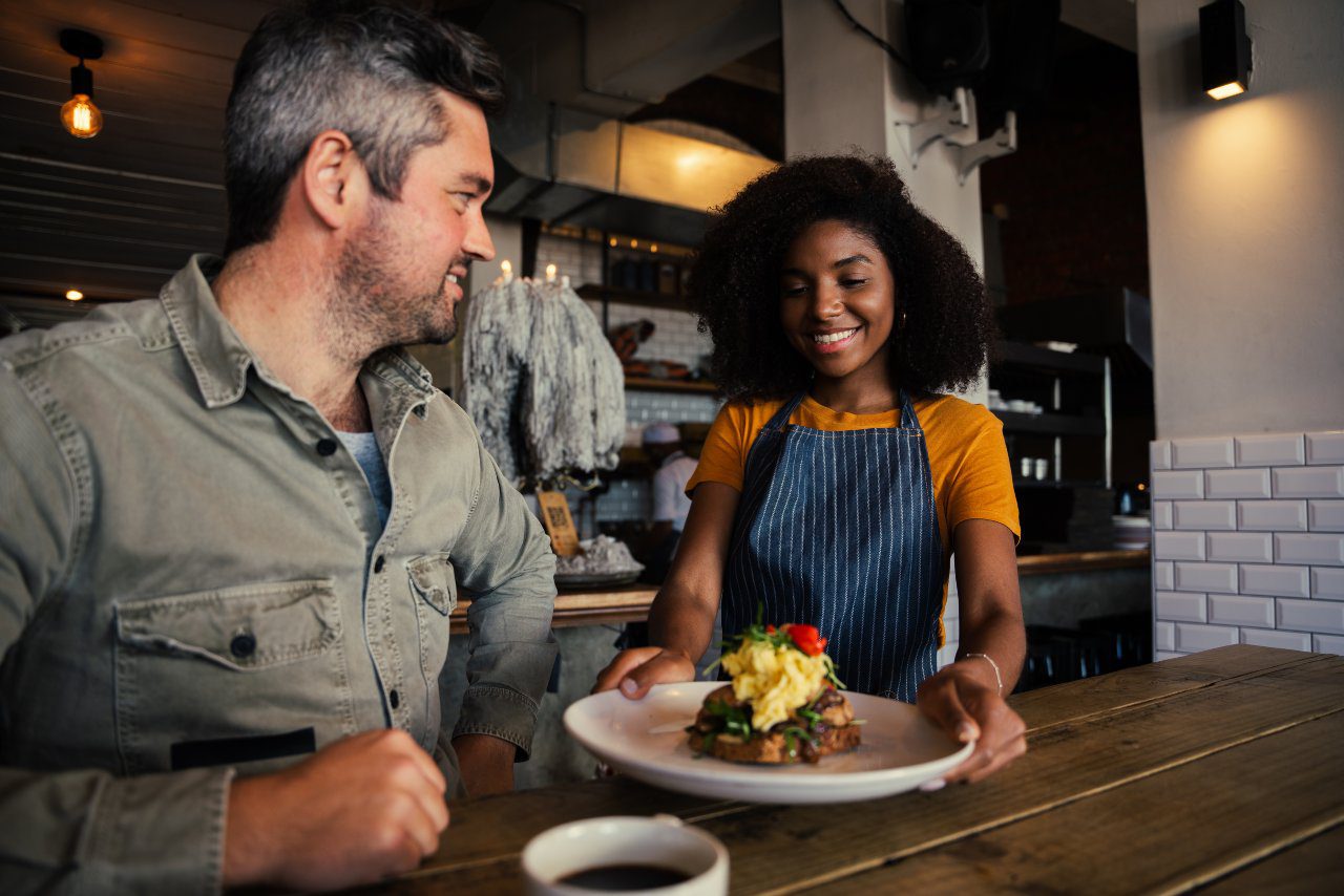 Waitress Serving Dinner